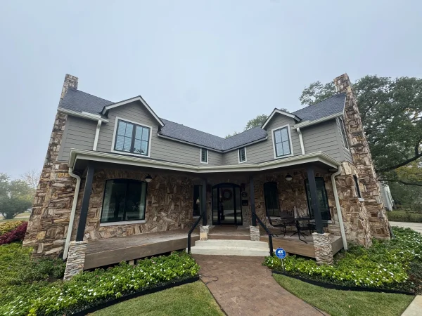 College Station home before window cleaning and exterior washing by Stonevale Exterior Co.