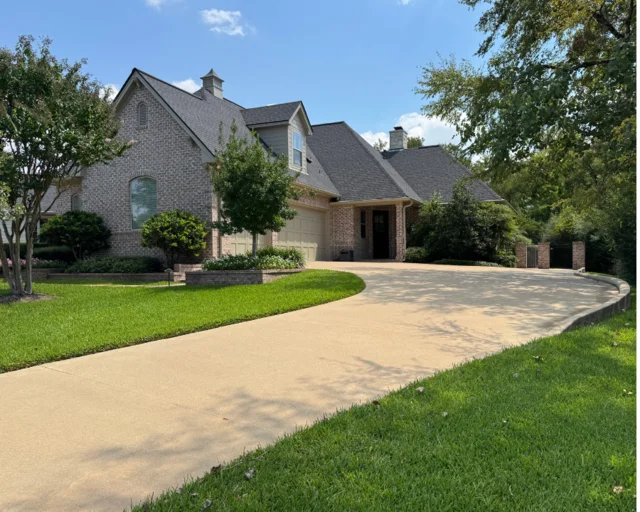 Before and after concrete cleaning showing dramatic improvement by Stonevale Exterior Co. power washing and house washing services in Kurten, TX
